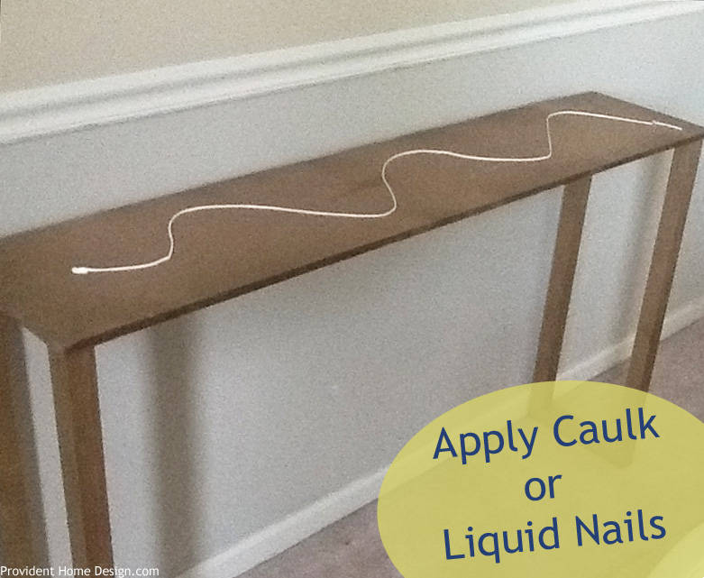 Apply caulk or liquid nails